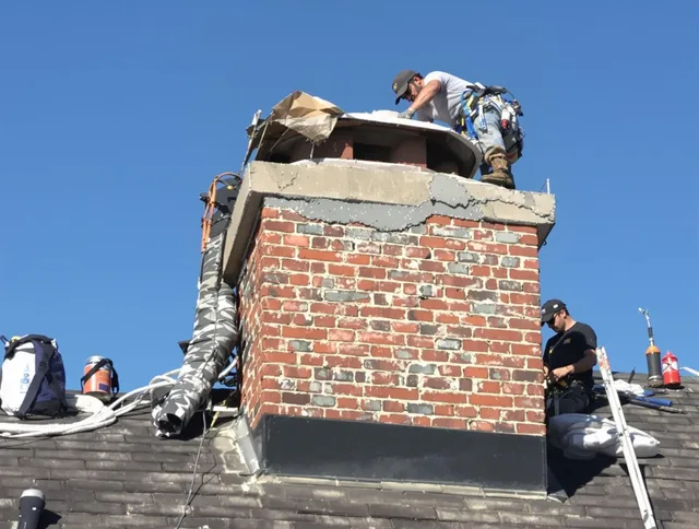 West Hollywood Chimney Sweep installing a custom chimney crown in West Hollywood, CA